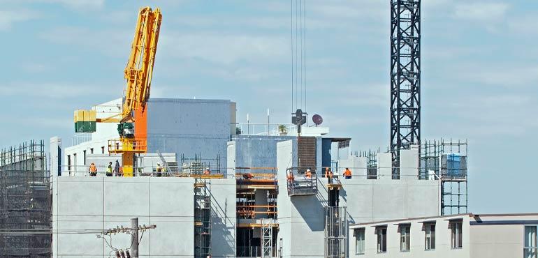 banner-complaints-16-large-building-cranes-blue