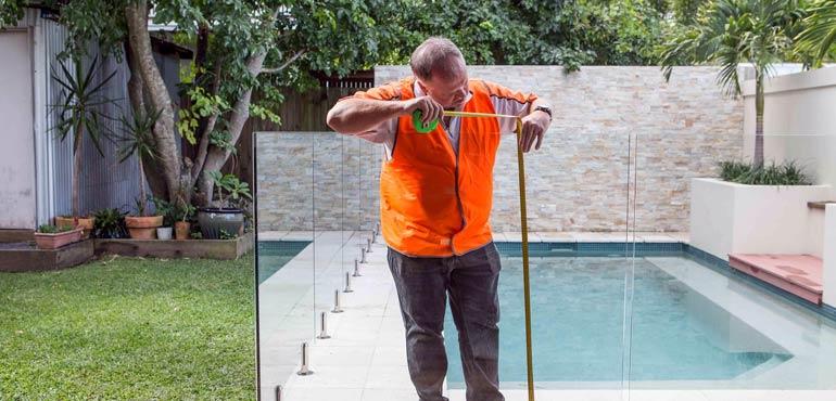 banner-pool-2-inspector-measure-glass-fence