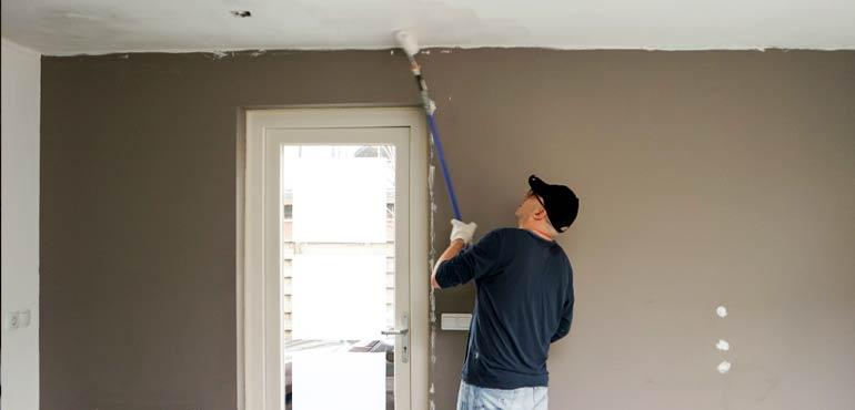 banner-property-10-man-painting-ceiling