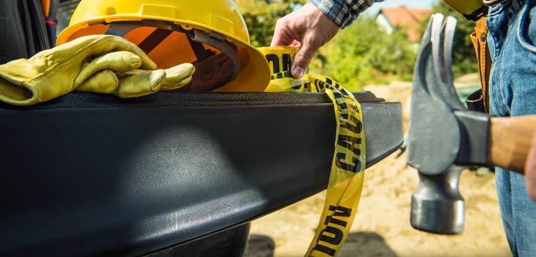 banner-complaints-47-hammer-caution-tape