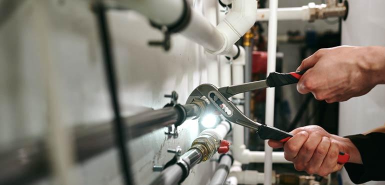 banner-licence-44-wrench-pipes-hand
