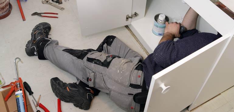 banner-plumbing-28-plumber-under-sink