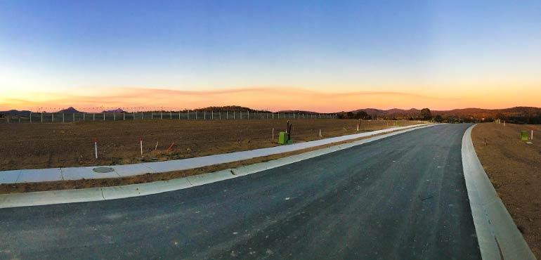 Open road with sunset in the distance