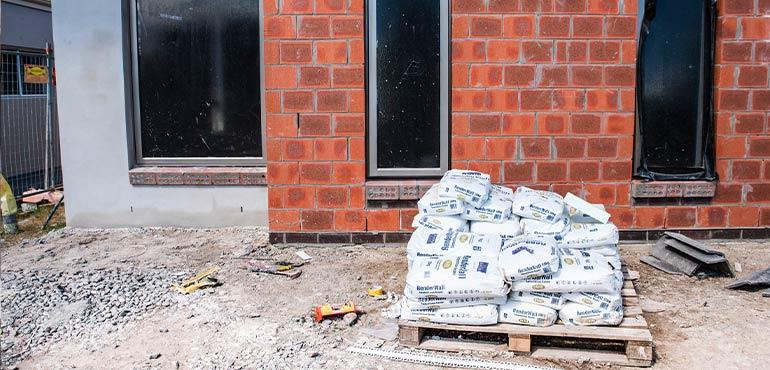 banner-property-16-brick-house-concrete-bags