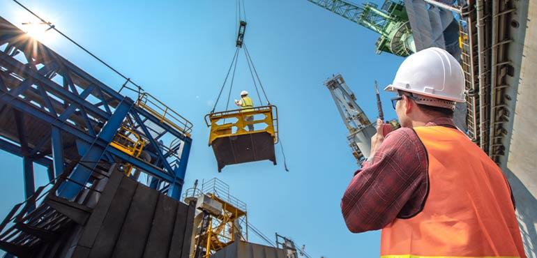banner-trust-2-man-directing-crane