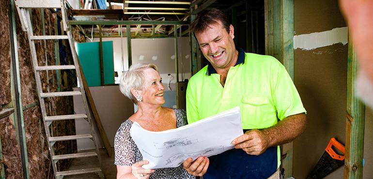 builder consulting a female home owner