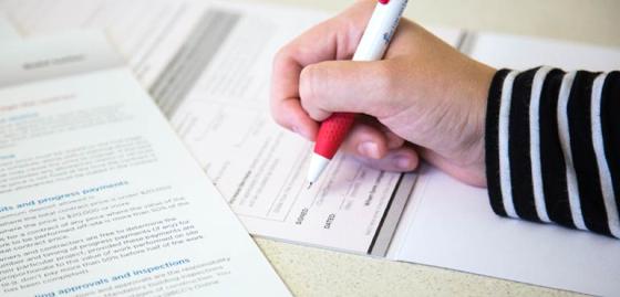 banner-property-18-contract-sign-pen-hand
